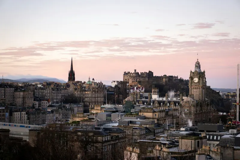 Edinburgh Castle and the city skyline at dusk